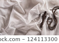 Good Friday and Holy week concept - A religious cross on white fabric background. 124113300