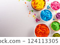 Happy Holi decoration, the indian festival.Top view of colorful holi powder on white background. 124113305