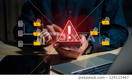 A warning alert icon signals a hacked document system as a man types on a keyboard, surrounded by digital files and documents, with a red cybersecurity threat alert prominent in the scene. A warning alert icon signals a hacked document system as a man types on a keyboard, surrounded by digital files and documents, with a red cybersecurity threat alert prominent in the scene. 124113467
