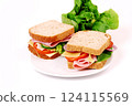 Healthy ham sandwich with cheese, tomatoes on white background 124115569