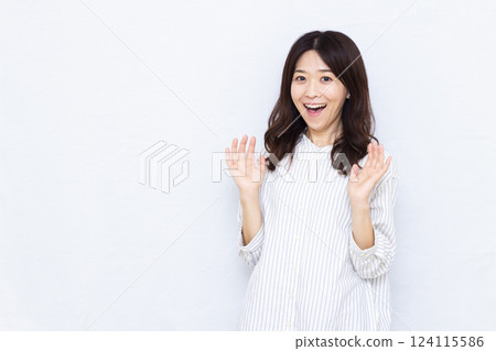 A woman surprised with a smile A woman surprised with a smile 124115586