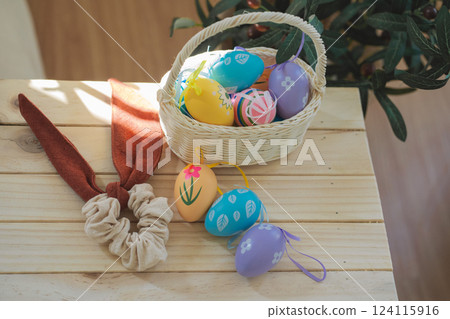 easter holiday concept with colorful egg and put in basket and put on wood table easter holiday concept with colorful egg and put in basket and put on wood table 124115916