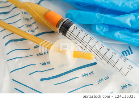 Foley catheter and urine drainage bag collect urine for disability or patient in hospital. 124116323