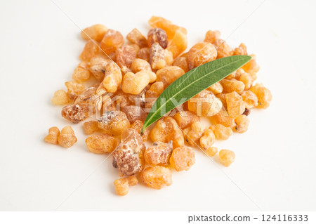 Frankincense or olibanum aromatic resin isolated on white background used in incense and perfumes. Frankincense or olibanum aromatic resin isolated on white background used in incense and perfumes. 124116333