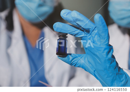 Researchers working in the clinical laboratory 124116550