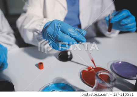 Researchers working in the clinical laboratory Researchers working in the clinical laboratory 124116551