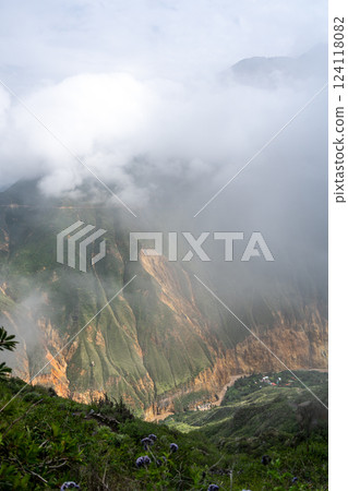 Colca Canyon and river in the mist and clouds, Peru Colca Canyon and river in the mist and clouds, Peru 124118082