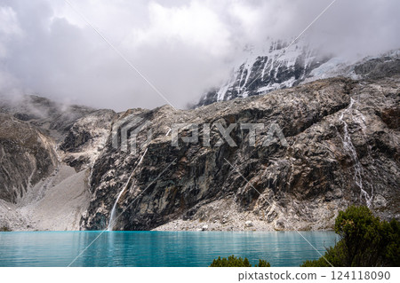 Laguna 69 with turquoise water and snowy mountains in Huaraz, Peru Laguna 69 with turquoise water and snowy mountains in Huaraz, Peru 124118090