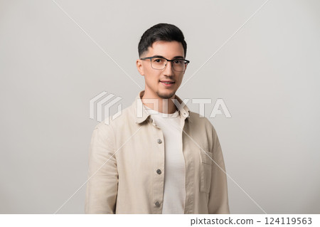 Confident IT student man, ready to embark on a new profession, prepares for practical work and career growth in technology and innovation 124119563