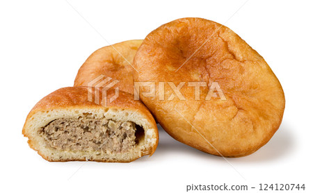 Meat pies and half on a white background. Isolated Meat pies and half on a white background. Isolated 124120744