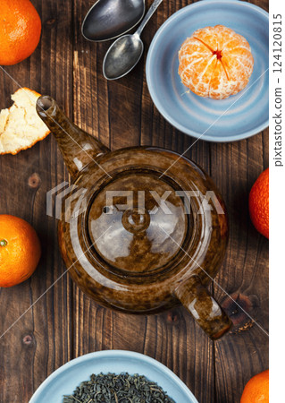 Mandarin tea in ceramic tea pot. Mandarin tea in ceramic tea pot. 124120815
