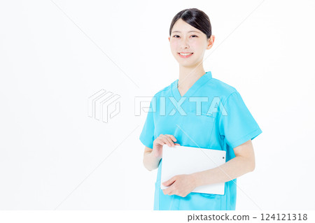 Nurse wearing scrubs, tablet Nurse wearing scrubs, tablet 124121318