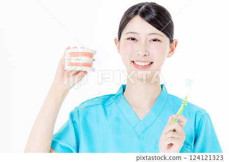 Female nurse wearing scrubs/dental hygienist 124121323