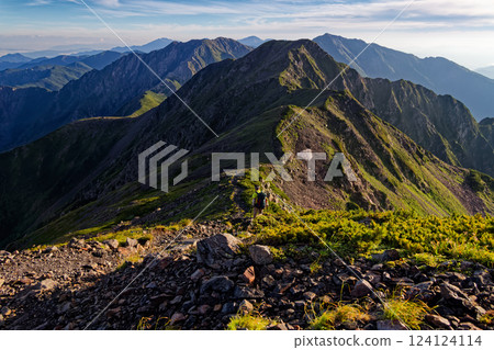 Climbers walking along the ridge of Akaishi-dake in the Southern Alps and the northern mountain range 124124114