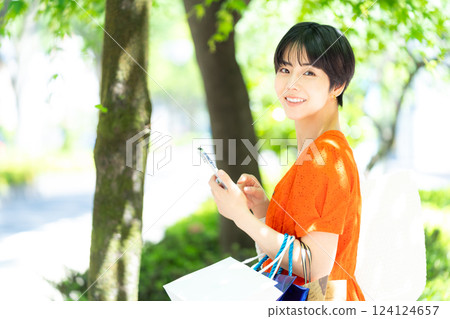 Young lady shopping Young lady shopping 124124657