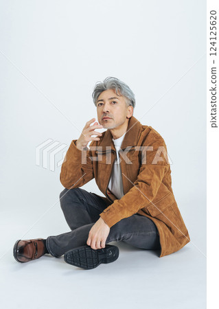 Fashion portrait of a stylish senior middle-aged man 124125620