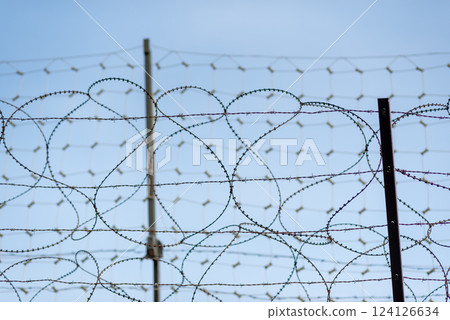 Barbwire at the DMZ Korean Demilitarized Zone that separates North and South Korea in Paju, South Korea 124126634