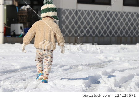 Playing in the snow, girl, boy, brother and sister 124127671