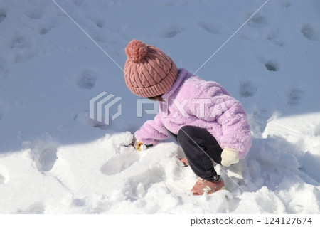 Playing in the snow, girl, boy, brother and sister 124127674