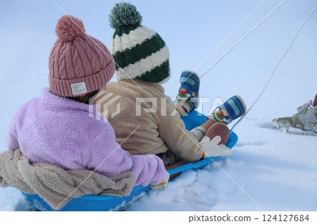 Playing in the snow, girl, boy, brother and sister 124127684