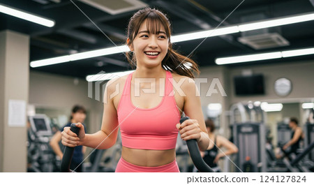 Young woman training in the gym 124127824