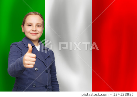 Student child holding thumb up with Italian flag background Student child holding thumb up with Italian flag background 124128985