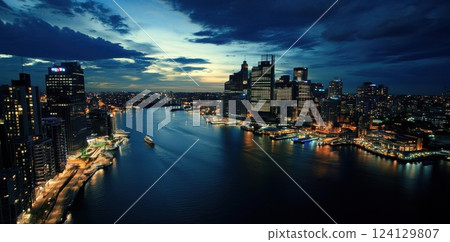 Futuristic Cityscape with Vibrant Buildings and Waterway with Speedboats, Digital Art 124129807