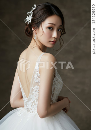 A young woman in a wedding dress looking at the camera (AI-generated image) A young woman in a wedding dress looking at the camera (AI-generated image) 124129980