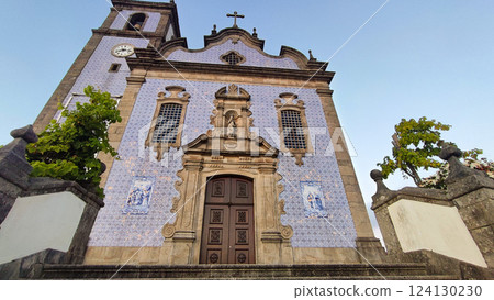 A church in Portugal covered with blue tiles in the city of Sao Joao de Madeira. The concept of traveling Europe, tourism, 124130230