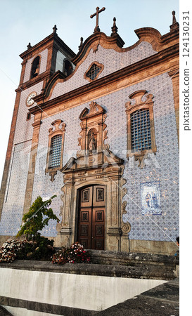 A church in Portugal covered with blue tiles in the city of Sao Joao de Madeira. The concept of traveling Europe, tourism, 124130231