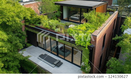 Urban rooftop garden with modern design, seating area in a serene city setting 124130627