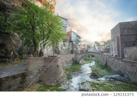 Sunny landscape of old city Tbilisi with river and trees Sunny landscape of old city Tbilisi with river and trees 124131373