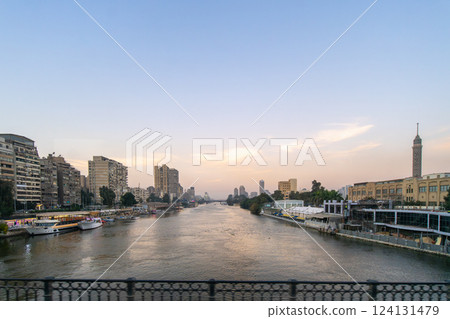 Cairo Skyline at Dusk Viewed from a Tourist Bus. Cairo Skyline at Dusk Viewed from a Tourist Bus. 124131479