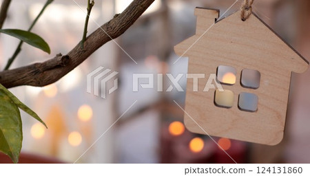 Create a charming DIY craft project with a plywood house shaped decoration for home decor 124131860