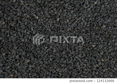 Whole black sesame seeds top view detailed shot 124132666