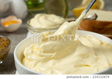 Classic traditional white mayonnaise in a bowl 124132674