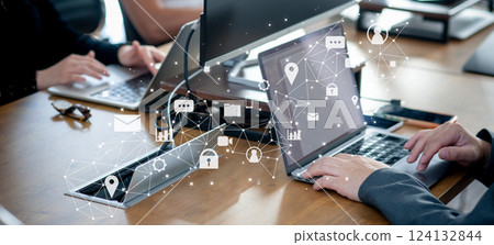 Business scene in office, man analyzing data on laptop, cloud, security, data analysis 124132844