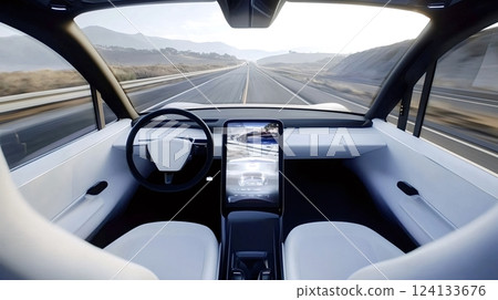 Autonomous electric car driving on highway showing interior and display screen 124133676