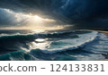 A dramatic seascape featuring turbulent waves crashing against a sandy beach. Dark, ominous clouds fill the sky, with a sliver of light breaking through, creating a contrast of light and shadow. 124133831