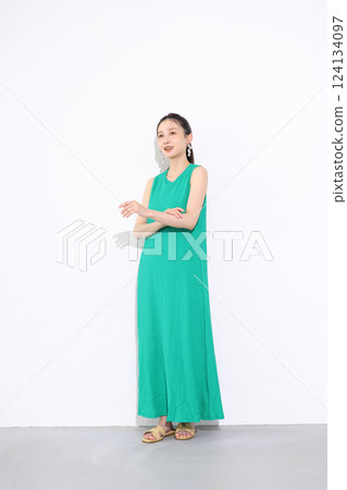 Woman in green dress 124134097