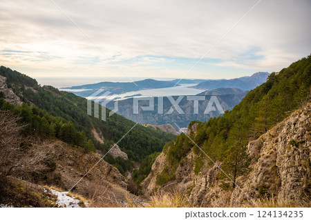 Panoramic view of Kotor Bay Boca and mountains from mountain view point in Montenegro in winter time 124134235