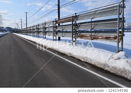 Snow protection fence Measures against snowstorms in snowy country 124134598