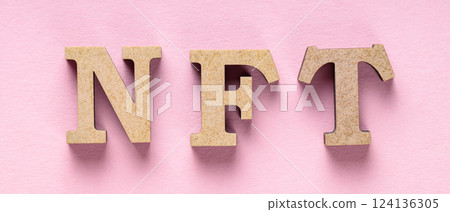 Non-Fungible Token on Pink Background, Minimalistic Crypto Art Concept, Top View 124136305