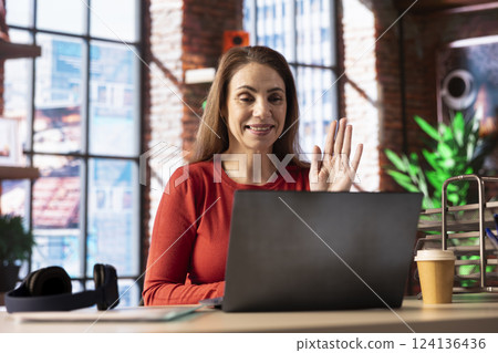 Mature person engaging in a virtual workshop to learn new skills for a job, interacting with the coach. Ambitious woman joining an interactive web learning session for personal development. Mature person engaging in a virtual workshop to learn new skills for a job, interacting with the coach. Ambitious woman joining an interactive web learning session for personal development. 124136436