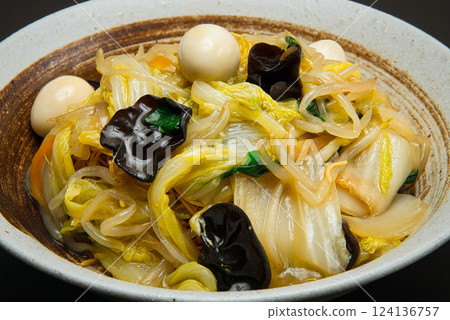 Crispy, hard-baked noodles topped with stir-fried vegetables and a thick sauce make this a perfect dish. Crispy, hard-baked noodles topped with stir-fried vegetables and a thick sauce make this a perfect dish. 124136757