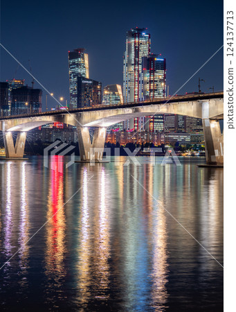 Night view of Han river Hangang and urban cityscape of Seoul, capital of South Korea Night view of Han river Hangang and urban cityscape of Seoul, capital of South Korea 124137713