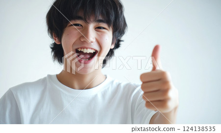 Boy giving a good sign Boy giving a good sign 124138535