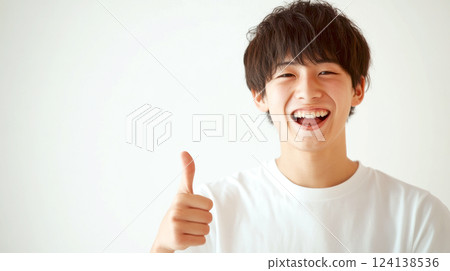 Boy giving a good sign Boy giving a good sign 124138536