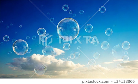 Soap bubbles dancing in the blue sky 124138806