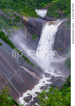 The roaring sound of Chihiro Falls during the rainy season in Yakushima National Park 124140769